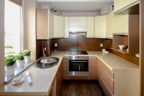 Modern fitted kitchen with handleless units